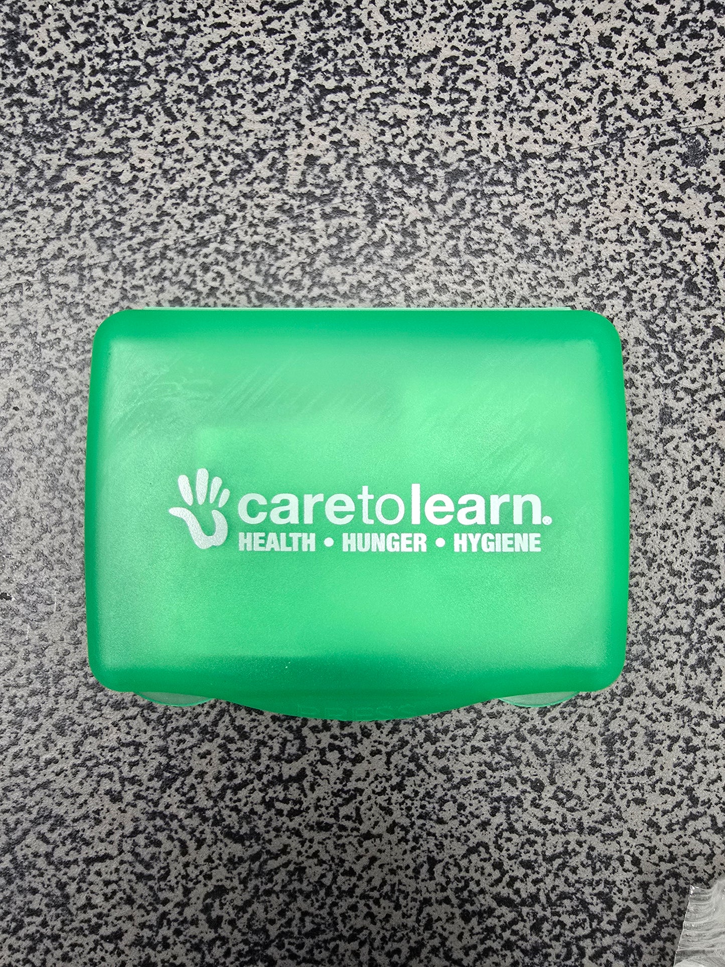 First Aid Kit w/ Care to Learn logo