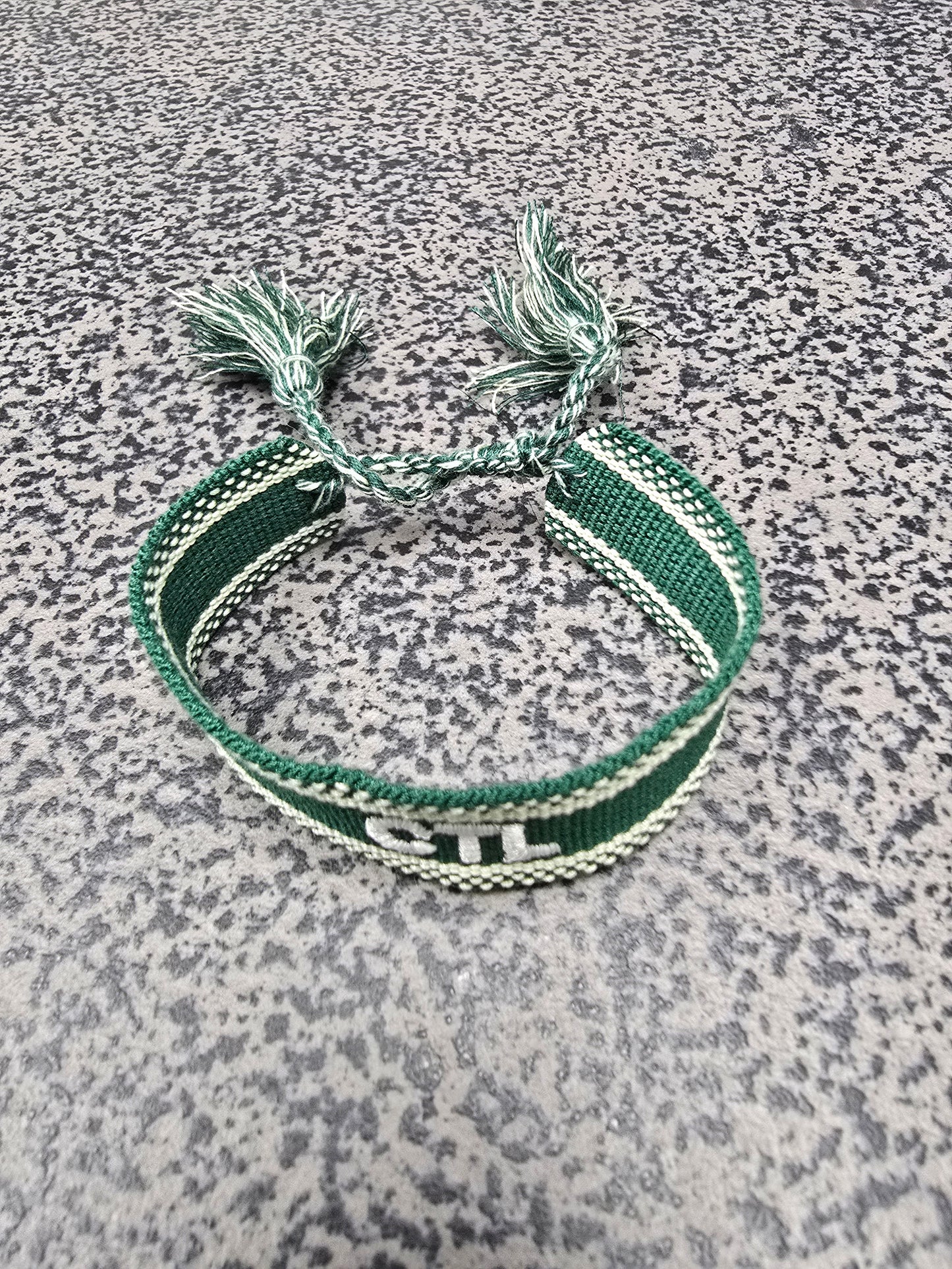 Bracelet: Embroidered with Care to Learn logo