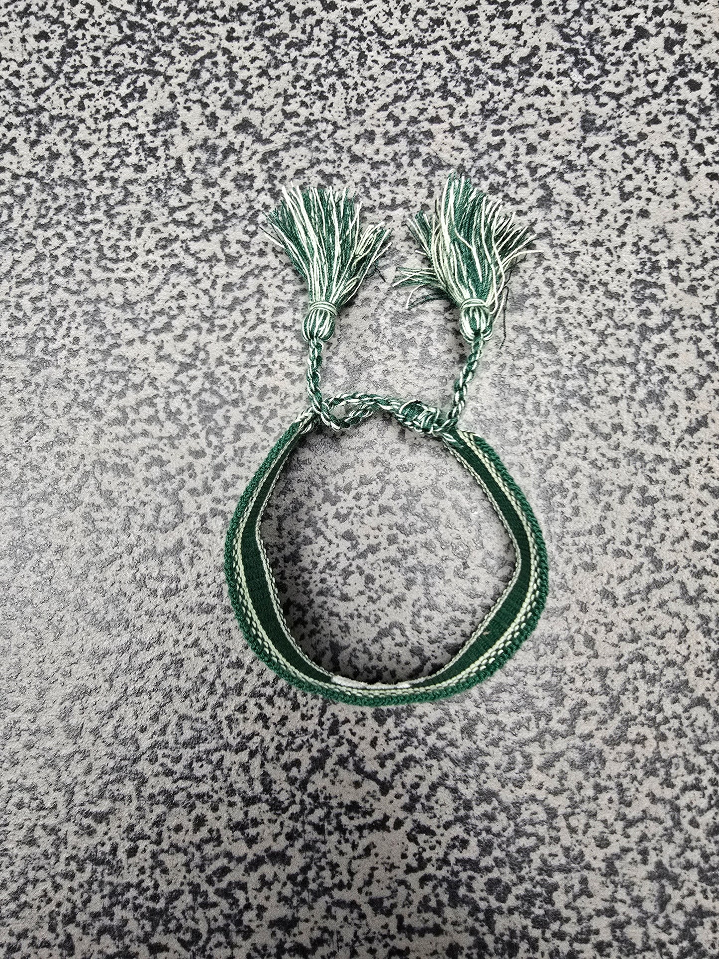 Bracelet: Embroidered with Care to Learn logo