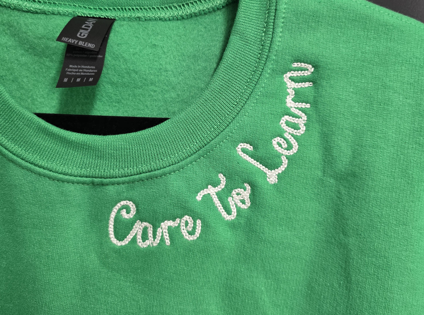 Sweatshirt: Care to Learn Neck Detail Kelly Green