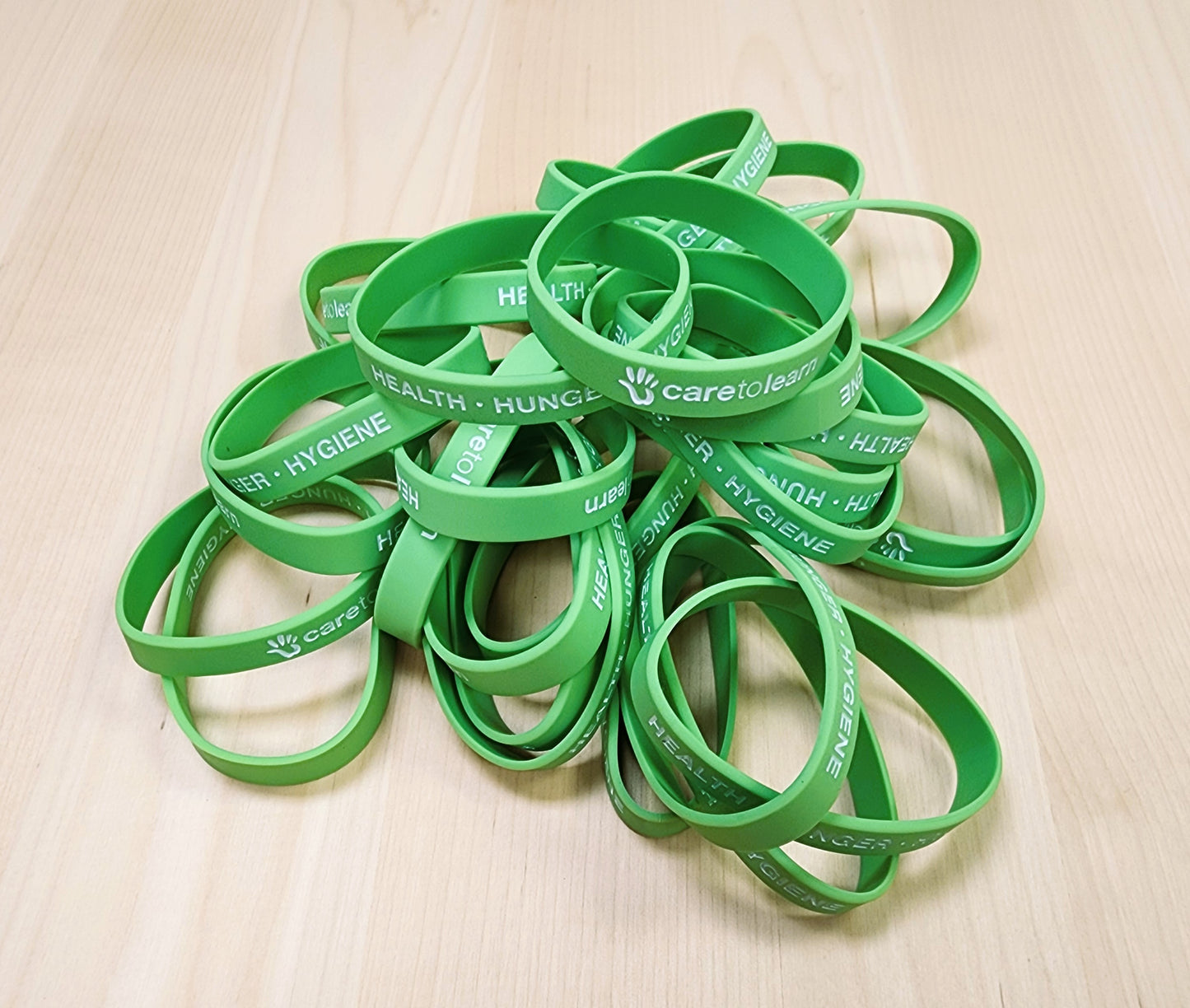 Bracelet: Care to Learn Wrist Band