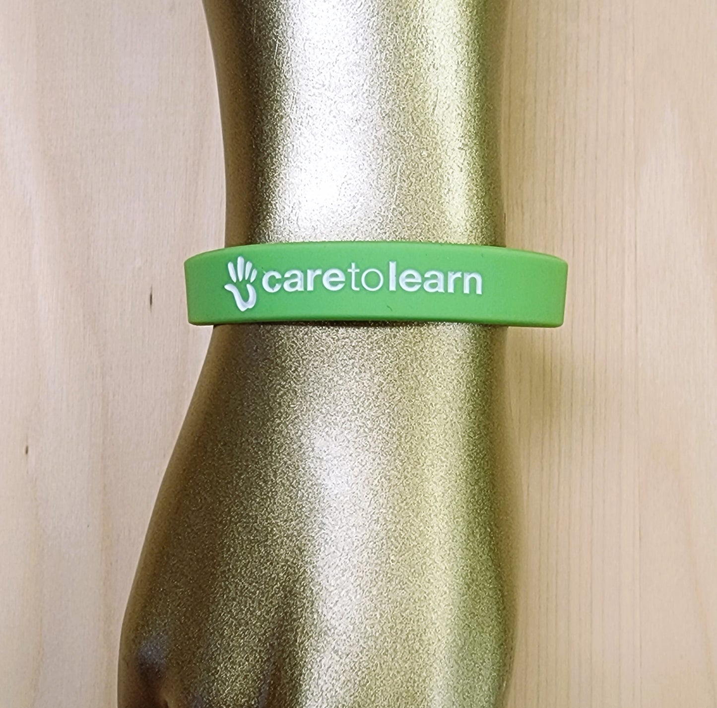 Bracelet: Care to Learn Wrist Band