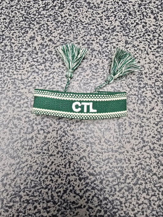 Bracelet: Embroidered with Care to Learn logo