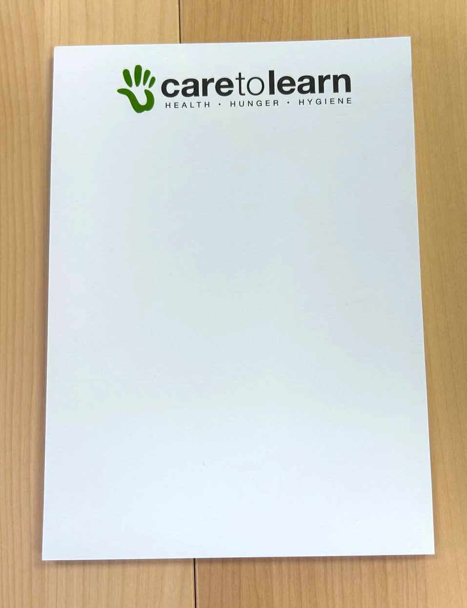 Sticky Pad: Care to Learn logo 3x5